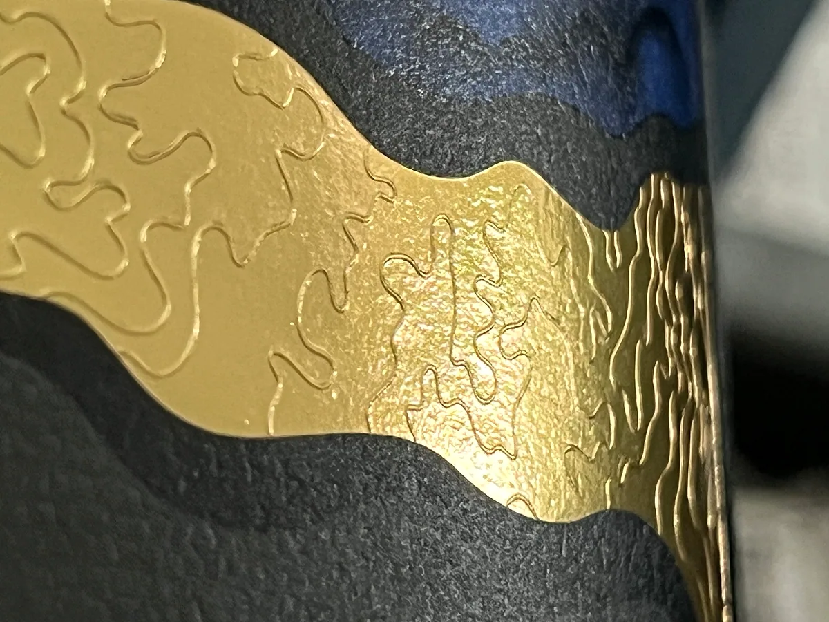 Premium spirit label with gold foil and textured finish