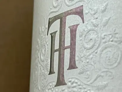 Close-up wine label with embossed detail